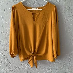 Mustard yellow elbow length sleeve shirt